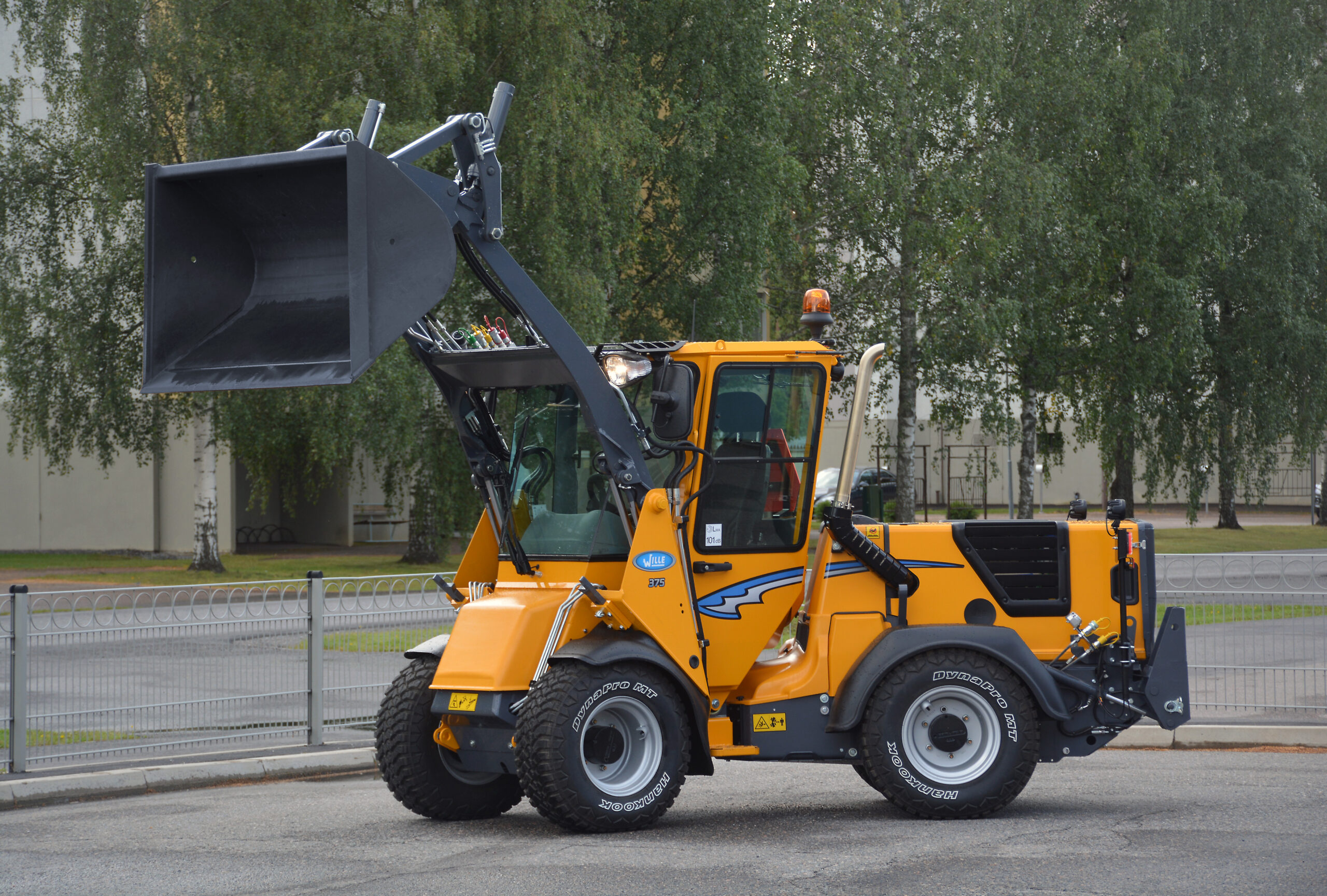 Wille 375 Delta compact environmental maintenance machine with loader bucket raised