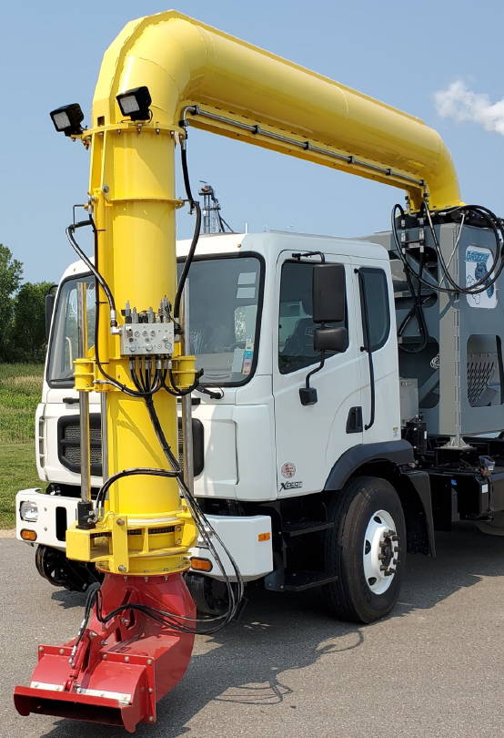 Grizzly Cold Air Blower truck-mounted unit with articulated nozzle for runway and taxiway clearing.