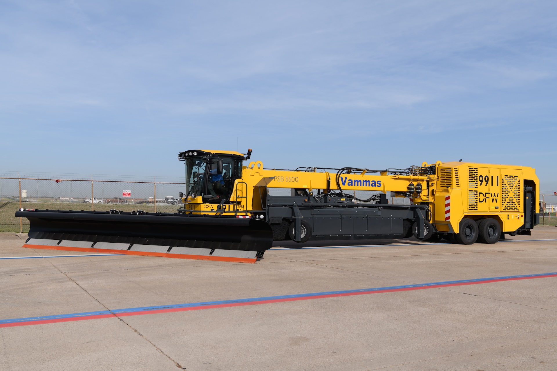 Vammas PSB5500 multi-function airport snow removal vehicle with plow, sweeper, and blower system on tarmac.