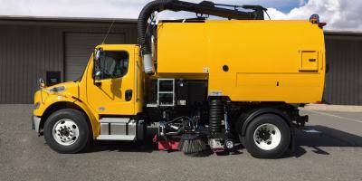 Bucher MaxPowa V80 Truck-mounted sweeper in yellow, side profile view.