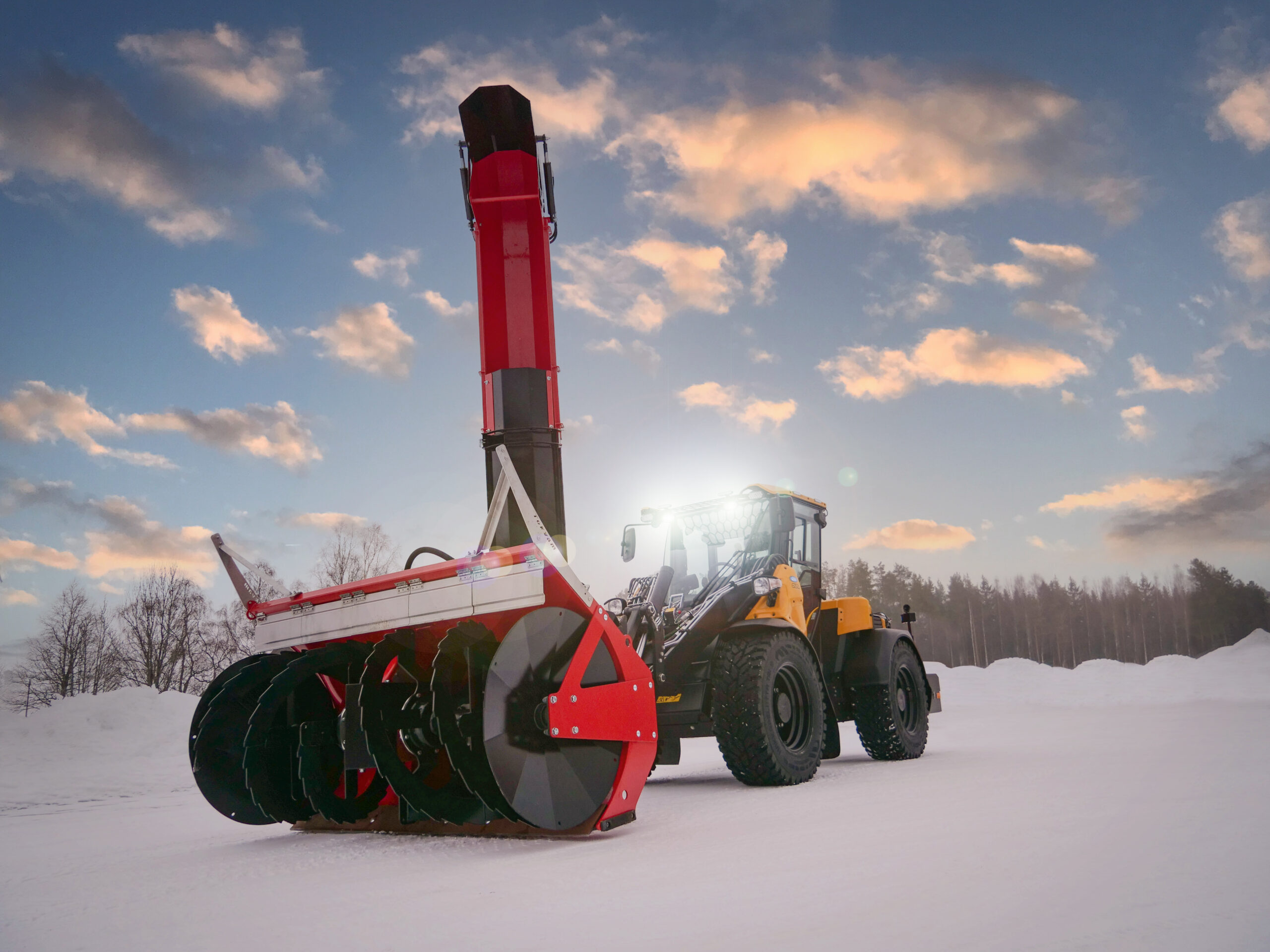 Wille 675 Delta environmental machine with high-capacity snow blower at dawn